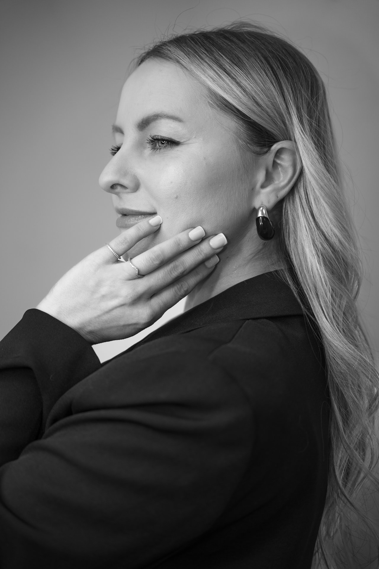 Black and white portrait of a woman with blonde hair